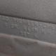 Text found under the armrest that screws to Brian’s 1996 Jeep Cherokee’s rear passenger-side door panel.